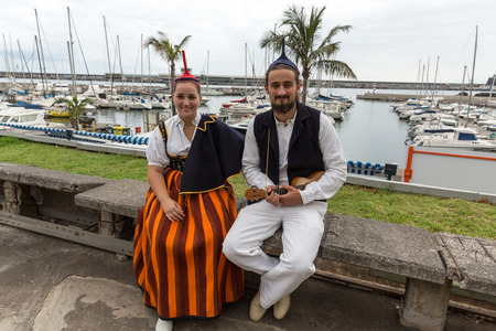 FUNCHAL, MADEIRA, PORTUGAL - SEPTEMBER 1, 2016: Portrait of a couple in traditional costume  in Funchal on Madeira. Portugalのeditorial素材
