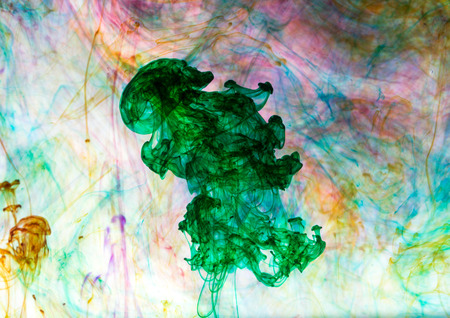 Acrylic colors and ink in water. Abstract background.