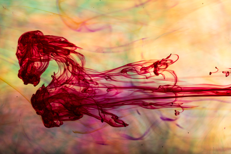 Acrylic colors and ink in water. Abstract background.の写真素材