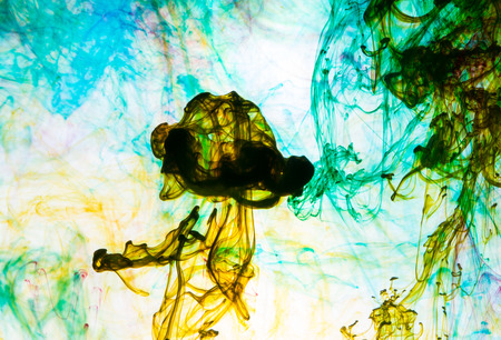 Acrylic colors and ink in water. Abstract background.