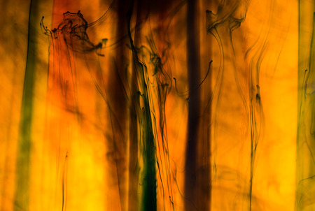 Acrylic colors and ink in water. Abstract background.の写真素材