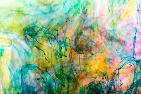 Acrylic colors and ink in water. Abstract background.