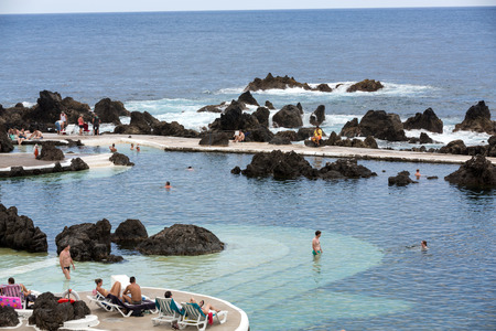 Natural rock pool of Porto Moniz. It is a public bath with water from the Atlantic Ocean.の写真素材