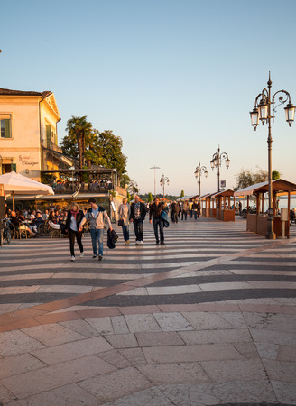 LAZISE, ITALY - MAY 5, 2016: Shops, bars and restaurants  in Lazise at Garda Lake. Italyのeditorial素材