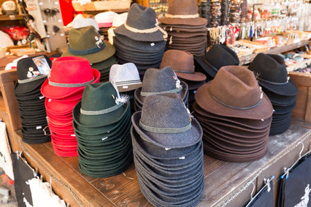 SALZBURG; AUSTRIA - APRIL 29; 2016:; Traditional austrian hats for sale in a outdoor souvenir shop in the center of Salzburg.のeditorial素材