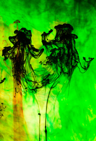 Acrylic colors and ink in water. Abstract background.の写真素材