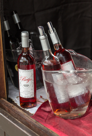FUNCHAL, MADEIRA, PORUGAL - SEPTEMBER 3, 2016:  Wine producers encourage to the tasting of their wines during Madeira wine Festival in Funchal on Madeira, Portugal,のeditorial素材