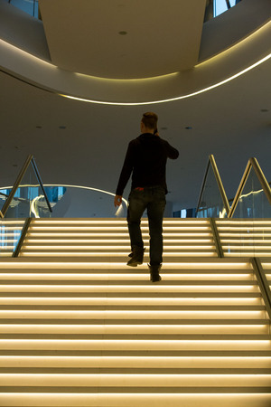 CRACOW, POLAND - FEBRUARY 14, 2016: Foyer with staircase. ICE Krakow Congress Center, KrakÃ³w, Poland. Architect: Ingarden & Ewy, Ararta Isozakiのeditorial素材