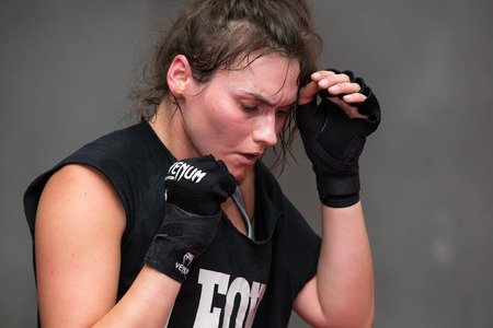 CRACOW, POLAND - FEBRUARY 12, 2016: Agnieszka Niestoj - talented Polish boxer durning boxing training with coach in the gym. Cracow, Polandのeditorial素材