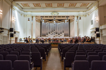 CRACOW, POLAND - SEPTEMBER 25, 2015:  View of the stage of the concert hall at the Cracow Philharmonic with the new Orgelbau organ in the background. Cracow, Polandのeditorial素材
