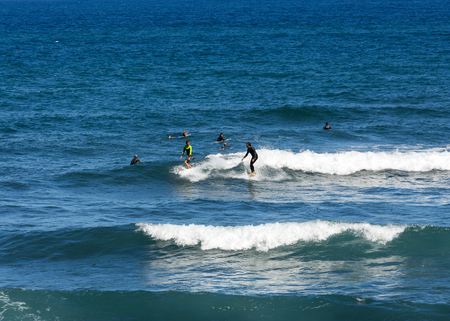MADEIRA, PORTUGAL SEPTEMBER 9, 2016: Surfers in action on Madeira Island. Portugalのeditorial素材