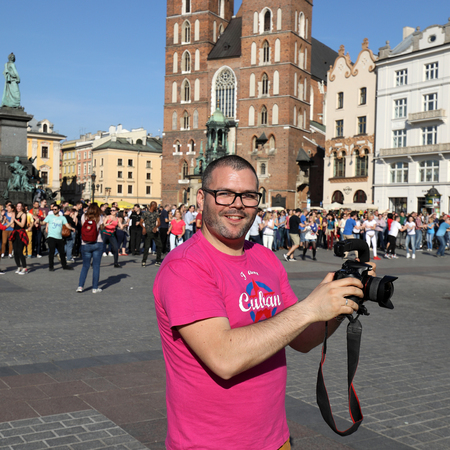 CRACOW, POLAND - APRIL 2, 2016: International Flashmob Day of Rueda de Casino, 57 countries, 160 cities. Several hundred persons dance Hispanic rhythms on the Main Square in Cracow. Polandのeditorial素材