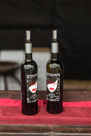 FUNCHAL, MADEIRA, PORUGAL - SEPTEMBER 3, 2016:  Wine producers encourage to the tasting of their wines during Madeira wine Festival in Funchal on Madeira, Portugal,のeditorial素材