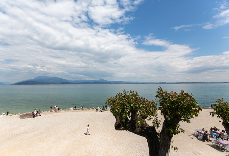 SIRMIONE, ITALY - MAY 5, 2016: The holiday resort town of Sirmione on Lake Garda, Lombardy, Italy.のeditorial素材