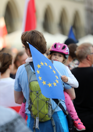 CRACOW, POLAND - JULY 23, 2017: Another day in Cracow  thousands of people protest against violation the constitutional law in Poland. Defense of the triad of division of power, free election and independence of the highest court in Polandのeditorial素材