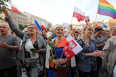 CRACOW, POLAND - JULY 23, 2017: Another day in Cracow  thousands of people protest against violation the constitutional law in Poland. Defense of the triad of division of power, free election and independence of the highest court in Polandのeditorial素材
