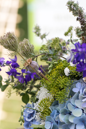 handmade  beautiful bouquets from flowers and herbsの写真素材