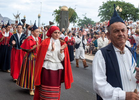 FUNCHAL, PORTUGAL - SEPTEMBER 4, 2016: Group of people in traditional costume  durnig historical and...