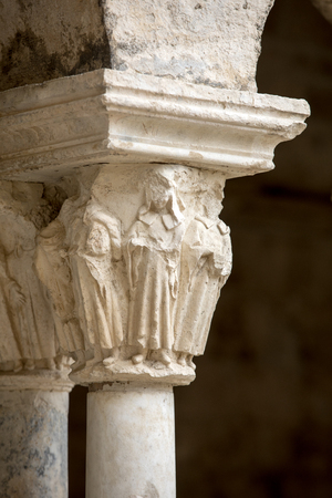 Romanesque capitals of the columns in the cloisters of the Abbey of Montmajour near Arles, Franceのeditorial素材