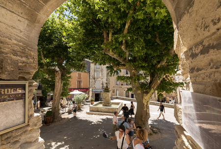 GORDES, FRANCE - JUNE 25, 2017:  Tourists in  in the medieval village Gordes, Vaucluse, Provence-Alpes-Côte d'Azur, Provence, France のeditorial素材