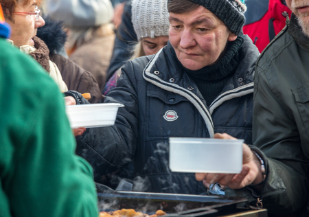Cracow, Poland - december 17, 2017:   Christmas Eve for poor and homeless on the Main Square in Cracow. Every year the group Kosciuszko prepares the greatest eve in the open air in Polandのeditorial素材