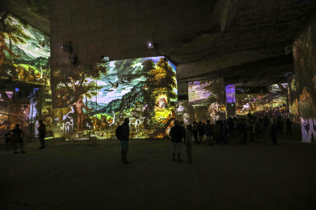 Les Baux, France - June 26, 2017: The Fantastic and Wonderful World of Bosch, Brueghel and Arcimboldo. The show lasts about thirty minutes and contains over 2,000 digital images displayed on an area of 7,000 m2 in the Carrières de Lumières with countless のeditorial素材