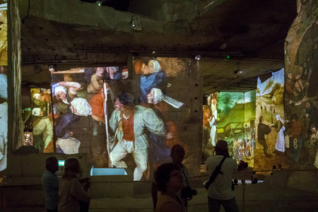 Les Baux, France - June 26, 2017: The Fantastic and Wonderful World of Bosch, Brueghel and Arcimboldo. The show lasts about thirty minutes and contains over 2,000 digital images displayed on an area of 7,000 m2 in the Carrières de Lumières with countless のeditorial素材