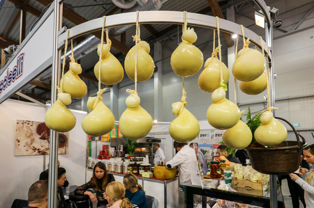 Cracow, Poland - November 16, 2017: Scamorza cheese hunged exposed at Gastrofood - Trade Fair for Food and Drinks for Catering in Cracow. Polandのeditorial素材