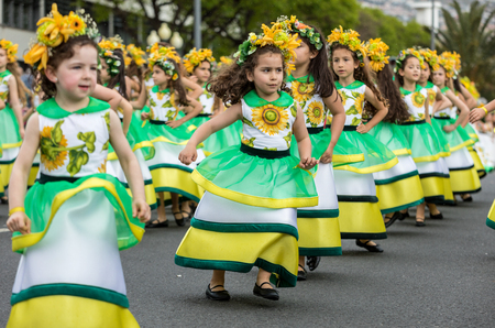 Funchal, Madeira, Portugal - April 22, 2018 : Annual parade of the Madeira Flower Festival in the city of Funchal on the Island of Madeira. Portugal.のeditorial素材