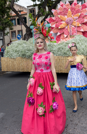 Funchal, Madeira, Portugal - April 22, 2018 : Annual parade of the Madeira Flower Festival in the city of Funchal on the Island of Madeira. Portugal.のeditorial素材