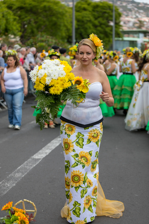 Funchal; Madeira; Portugal - April 22; 2018: The last moments before the parade,people in colorful costumes at the Madeira Flower Festival , Funchal, Madeira, Portugalのeditorial素材