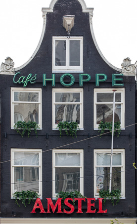 Amsterdam, Netherlands - April 20, 2017: Traditional historic Dutch gable houses beside canal in Amsterdam The Netherlandsのeditorial素材