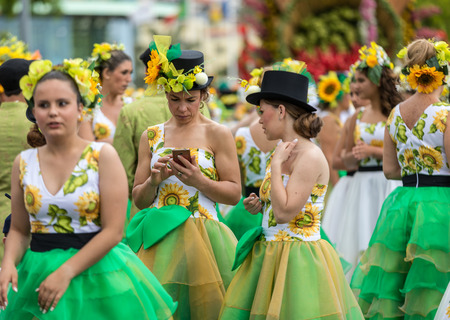 Funchal; Madeira; Portugal - April 22; 2018: The last moments before the parade,people in colorful costumes at the Madeira Flower Festival , Funchal, Madeira, Portugalのeditorial素材