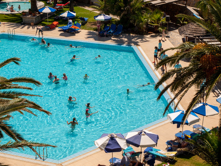 Malia. Crete, Greece - July 3, 2018: Swimming pool at luxury hotel in Malia on Crete, Greece