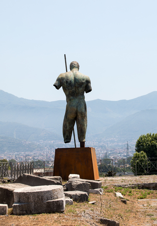 Pompeii, Italy: Sculptures of the Polish sculptor Igor Mitoraj on display at Pompeii archaeological site, the ancient Roman city, destroyed in 79 BC by the eruption of Mount Vesuvius.の写真素材