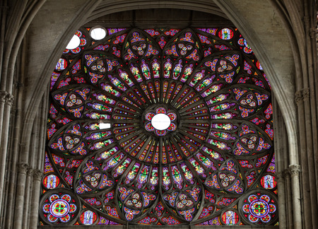 Troyes, France - August 31, 2018: Colorful stained glass windows in Troyes Cathedral  dedicated to...