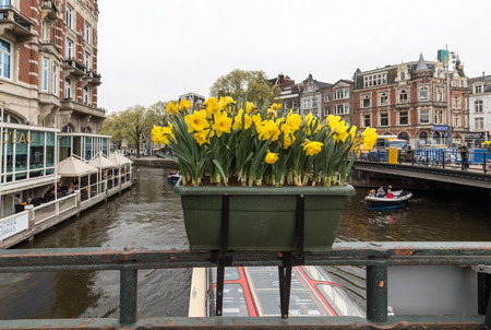 Amsterdam, Netherlands - April 20, 2017: Canal  scene with  traditional Dutch houses in Amsterdam. Netherlandsのeditorial素材