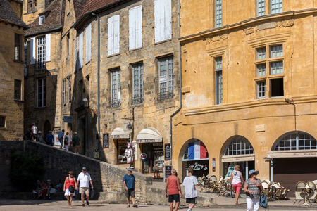 Sarlat, France - September 2, 2018: Historic houses surrounding Place de la Liberte in Sarlat la Caneda in Dordogne Department, Aquitaine, Franceのeditorial素材