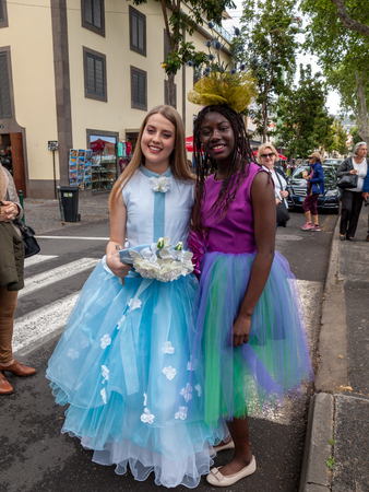 Funchal; Madeira; Portugal - April 19; 2018: Women in colorful costumes at the Madeira Flower Festival , Funchal, Madeira, Portugalのeditorial素材