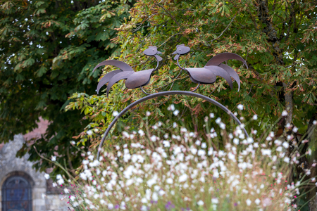 Domme, France - September 5, 2018: Symbolic  roosters statue  in Domme. Dordogne Department, Aquitaine, France. Domme is famous for foie gras and fine diningのeditorial素材
