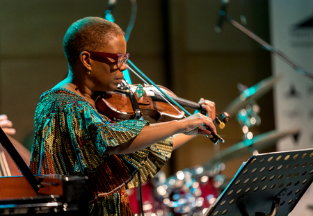 Cracow, Poland - March 9, 2019: Regina Carter, American jazz violinist an AMC Trio  live on stage of Manggha Museum of Japanese Art and Technology. Krakow. Polandのeditorial素材