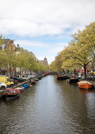 Amsterdam, Netherlands - April 20, 2017: Traditional historic Dutch gable houses beside canal in Amsterdam The Netherlandsのeditorial素材
