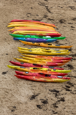 Colorful canoes on beach in Saint Malo,  Brittany, Franceのeditorial素材