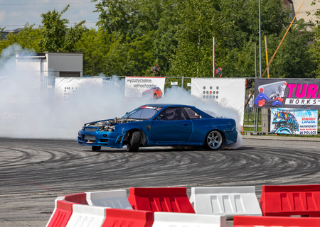 Cracow, Poland - May 18, 2019: Drift car in action  at 5th edition of Moto Show in Cracow. Poland.