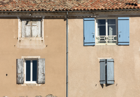 Old  house with  wooden shutters, Provence, France.のeditorial素材