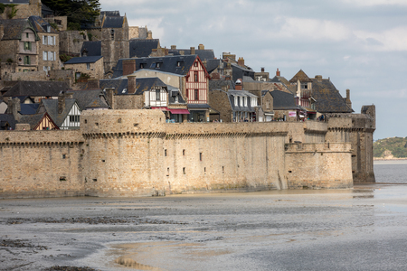 Le Mont Saint-Michel, medieval fortified abbey and village on a tidal island in the Normandy, France, at low tideのeditorial素材