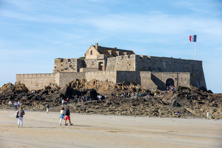 St Malo, France - September 15, 2018: Romantic walk of people before sunset on the picturesque beach of Saint Malo. Brittany, Franceのeditorial素材