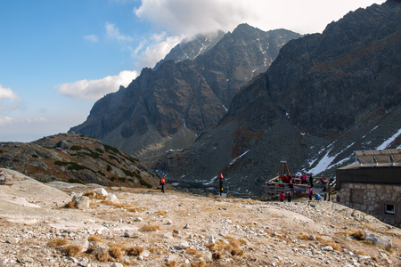 Vysoke Tatry, Slovakia - October 10, 2018: Hikers on trail at Great Cold Valley,  Vysoke Tatry (High Tatras), Slovakia. The Great Cold Valley is 7 km long valley, very attractive for touristsのeditorial素材