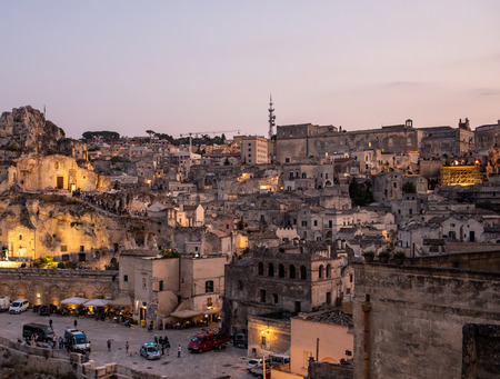 Matera; Italy - September 17; 2019: Bond 25. Scene of a procession with extras carrying candles. from the movie "No Time to Die" in Sassi; Matera; Italy.のeditorial素材