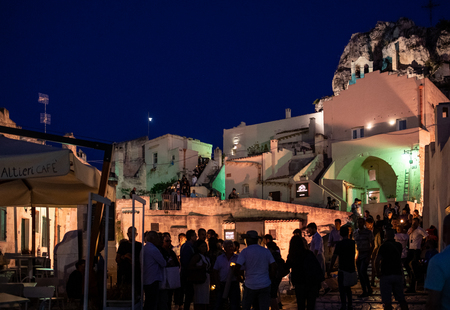 Matera; Italy - September 17; 2019: Bond 25. Scene of a procession with extras carrying candles. from the movie "No Time to Die" in Sassi; Matera; Italy.のeditorial素材